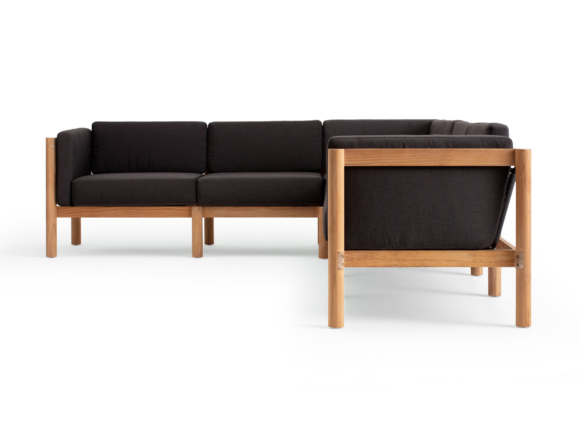 Side view of 6-piece outdoor sectional with black arm cushions